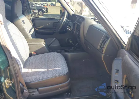 2000 Jeep Cherokee Sport from USA, damaged, VIN 1J4FF48S3YL128629